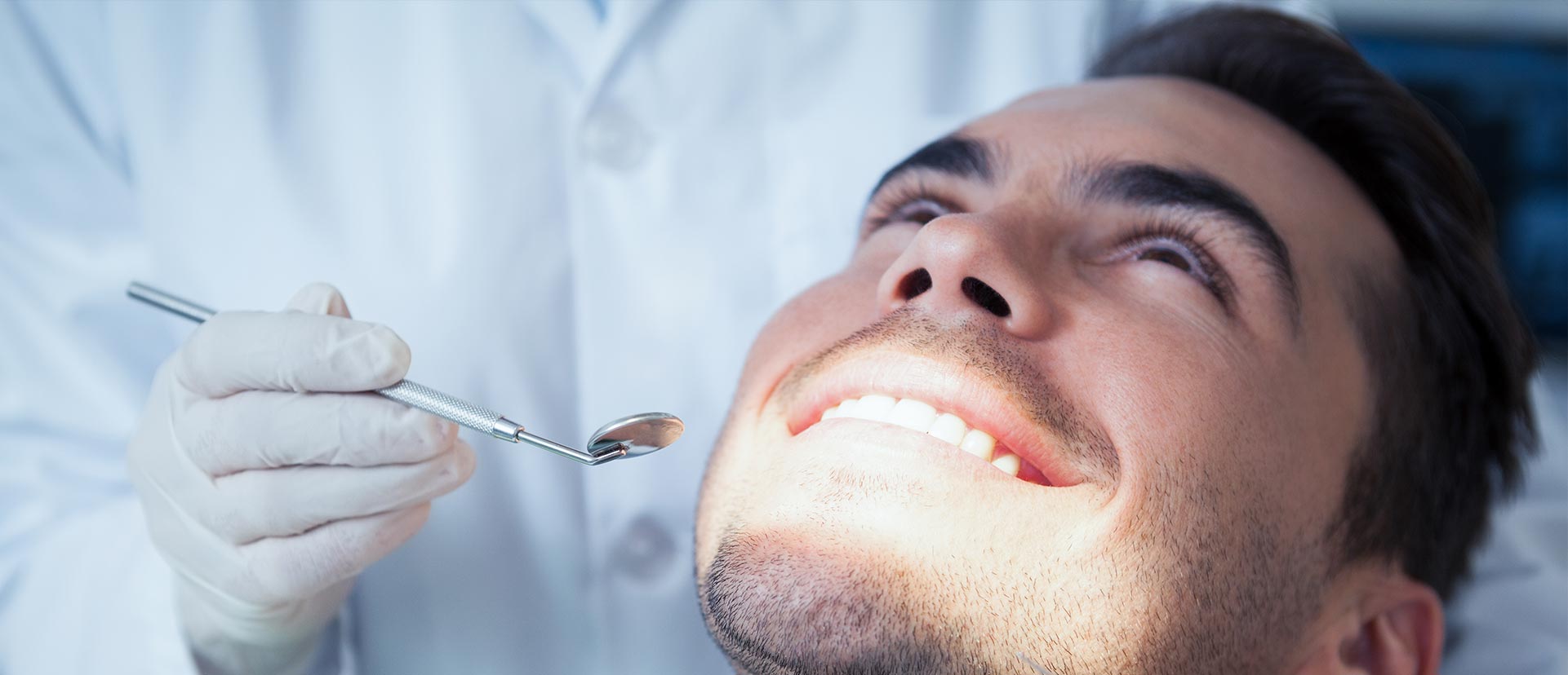 Man smiling at the dental