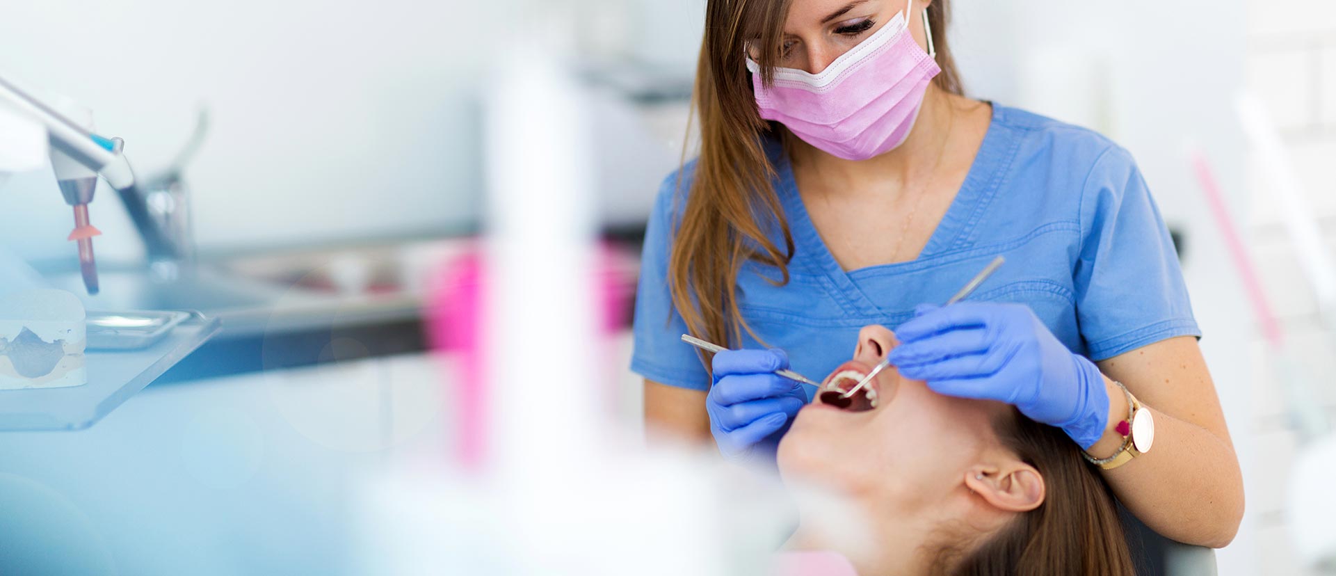 Woman having dental surgery at the dental